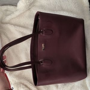 Purple Kate Spade tote with matching wallet